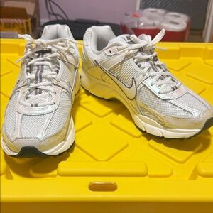 Nike Cream and Silver Athletic Shoes